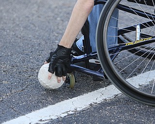ROBERT K. YOSAY | THE VINDICATOR. The Adaptive Sports Program of Ohio - wheelchair softball - at the Covelli Centre parking lot