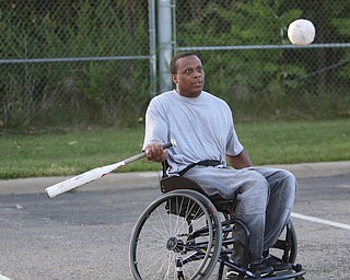 ROBERT K. YOSAY | THE VINDICATOR. The Adaptive Sports Program of Ohio - wheelchair softball - at the Covelli Centre parking lot