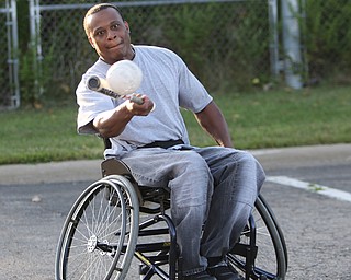 ROBERT K. YOSAY | THE VINDICATOR. The Adaptive Sports Program of Ohio - wheelchair softball - at the Covelli Centre parking lot