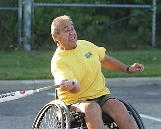 ROBERT K. YOSAY | THE VINDICATOR. The Adaptive Sports Program of Ohio - wheelchair softball - at the Covelli Centre parking lot