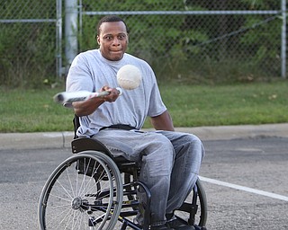 ROBERT K. YOSAY | THE VINDICATOR. The Adaptive Sports Program of Ohio - wheelchair softball - at the Covelli Centre parking lot