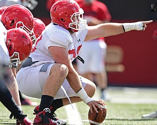 YOUNGSTOWN, OHIO - AUGUST 8, 2017: Youngstown State's Vitas Hrynkiewicz calls out the defense before the snap of the football during the teams practice Tuesday morning at Stambaugh Stadium. DAVID DERMER | THE VINDICATOR
