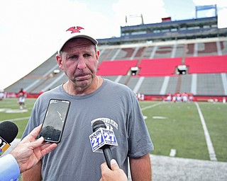 YOUNGSTOWN, OHIO - AUGUST 8, 2017: Youngstown State head coach Bo Pelini answers questions from the local media following the teams practice Tuesday morning at Stambaugh Stadium. DAVID DERMER | THE VINDICATOR