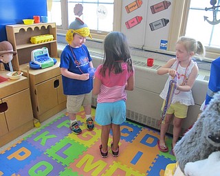 Neighbors | Alexis Bartolomucci.Children at the Success By 6 program dressed up and played with each other at Poland North Preschool.