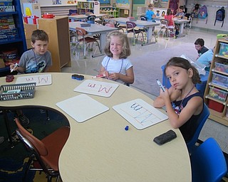 Neighbors | Alexis Bartolomucci.Children in the Success By 6 program at Poland North Preschool worked on writing their letters of the alphabet.