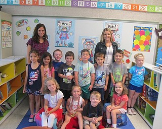 Neighbors | Alexis Bartolomucci.Bailey and Samantha stood with the children they are teaching at the Success By 6 program at Poland North Preschool.