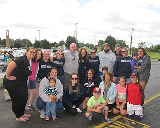 Neighbors | Alexis Bartolomucci.Members of the Celebrate program at St. Christine Parish gathered at the Trunk or Treasure sale in the St. Christine parking lot on Aug. 5.