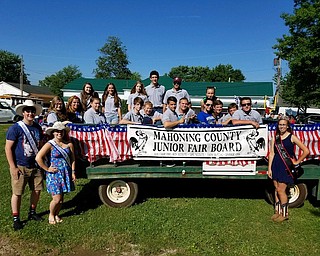 The Mahoning County Junior Fair Board promoted the Canfield Junior Fair with a float in the Canfield Fourth of July Parade. The senior fair board furnished the truck and people-mover for the group.