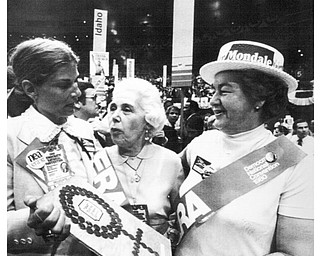 New York Aug 11, 1980 Members of the Ohio delagation promoting the ERA hold one of the plaques they plan to give to delegations form states which have not adopted the ERA Left to right they are: Susan Schwartz chairwoman o fhte Ohio ERA committee, Gertrubde DonaheySec/treas. of hteOhio ERA group and delegate Jennie Delasandro
