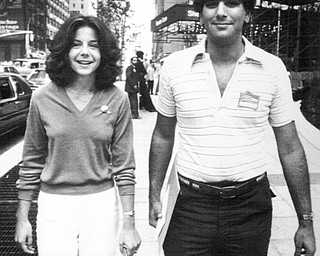 New York Aug 11, 1980 Karen Kolmaci of Campbell and Rick Shaker of Niles walk towards Madison Square Garden in New york prior to the opening session of the 1980 Democratic National Covention. The two law students are both alternate delegates with the Ohio delegation.