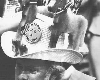 New York Aug 11, 1980  An unidentified delegate wears a western style hat festooned with Carter Mondale pictures and small donkies on hte floor of 1980 DNC in New York.