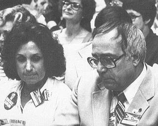 New York Aug. 11, 1980 Ohio delegates Florence Vitullo of Campbell and Russell Sadey of Austintown confer while seated in Madison Square Garden.