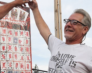 William D Lewis The Vindicator  Crickets Queen of Hearts winner John Riley of Youngstown holds winning card after winning 8-14-17.