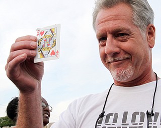 William D Lewis The Vindicator Crickets Queen of Hearts winner John Riley of Youngstown holds winning card after winning 8-14-17.