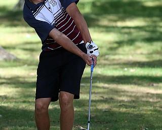 8-16-17 GOLF Boys  Boardman Spartans vs Howland Tigers at Tamer Wind Course, Cortland, OH..Boardman's Bryan Kordupel hits his approach shot on the 17th.