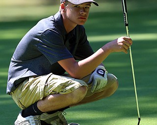 8-16-17 GOLF Boys  Boardman Spartans vs Howland Tigers at Tamer Wind Course, Cortland, OH..Howland's Colin Davis on 17th green.