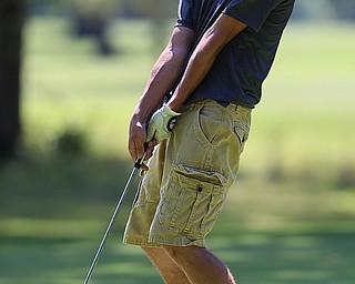 8-16-17 GOLF Boys  Boardman Spartans vs Howland Tigers at Tamer Wind Course, Cortland, OH..Howland's Colin Davis reacts to his putt on trhe 17th hole.