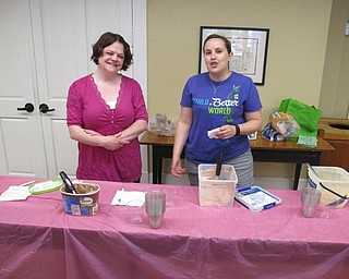 Neighbors | Zack Shively.Poland librarians Amanda Kollar and Annette Ahrens served ice cream for the Ice Cream Bash on Aug. 8.