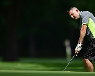 BOARDMAN, OHIO - AUGUST 18, 2017: Vince Gentile chips out of the short rough on the 10th hole of the south Course, Friday afternoon during the Vindicator Greatest Golfer Tournament. DAVID DERMER | THE VINDICATOR