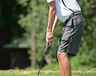 BOARDMAN, OHIO - AUGUST 18, 2017: Brandon Pluchinsky putts on the 6th hole of the North Course, Friday afternoon during the Vindicator Greatest Golfer Tournament. DAVID DERMER | THE VINDICATOR