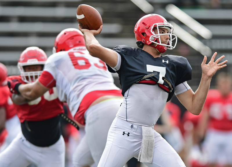 YOUNGSTOWN, OHIO - AUGUST 19, 2017: Youngstown State's Nathan Mays throws a pass from the pocket during the teams practice Saturday morning at Stambaugh Stadium. DAVID DERMER | THE VINDICATOR