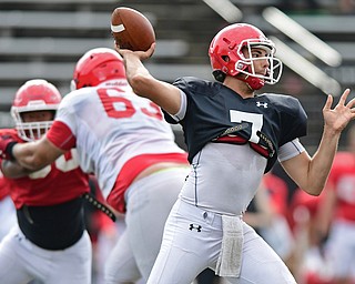 YOUNGSTOWN, OHIO - AUGUST 19, 2017: Youngstown State's Nathan Mays throws a pass from the pocket during the teams practice Saturday morning at Stambaugh Stadium. DAVID DERMER | THE VINDICATOR