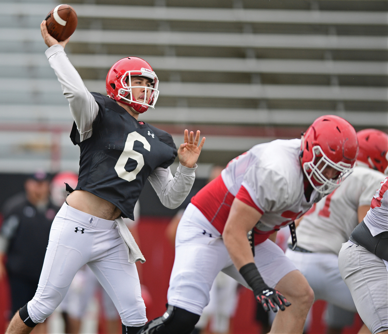 YOUNGSTOWN, OHIO - AUGUST 19, 2017: Youngstown State's Hunter Wells throws a pass from the pocket during the teams practice Saturday morning at Stambaugh Stadium. DAVID DERMER | THE VINDICATOR