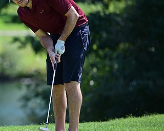 LIBERTY, OHIO - AUGUST 19, 2017: Joe Alfano Jr. putts on the 9th hole, Saturday afternoon during the Vindy Greatest Golfer at Youngstown Country Club. DAVID DERMER | THE VINDICATOR