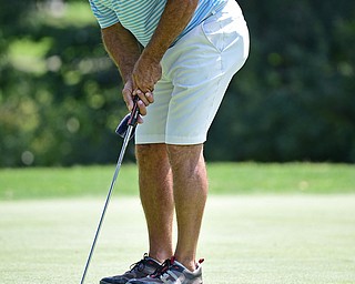 LIBERTY, OHIO - AUGUST 19, 2017: Ron Snyder putts on the 9th hole, Saturday afternoon during the Vindy Greatest Golfer at Youngstown Country Club. DAVID DERMER | THE VINDICATOR