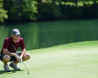 LIBERTY, OHIO - AUGUST 19, 2017: Joe Alfano Jr. reads the green on the 9th hole, Saturday afternoon during the Vindy Greatest Golfer at Youngstown Country Club. DAVID DERMER | THE VINDICATOR