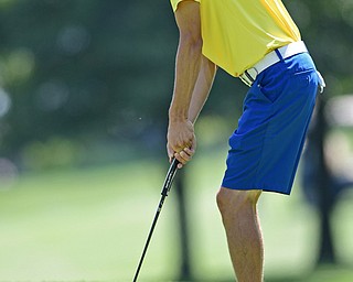 POLAND, OHIO - AUGUST 20, 2017: Brandon Pluchinsky putts on the 1st hole during the final round of the Vindy Greatest Golf Tournament, Sunday afternoon at the Lake Club. DAVID DERMER | THE VINDICATOR
