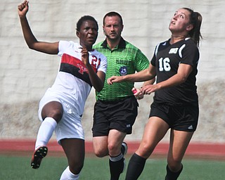 William D. Lewis The Vindicator  YSU'sNicole Dembie(21) and Bonaventure's Danielle Vis(16) go for the ball during season opener Monday 8-21-17 at YSU.