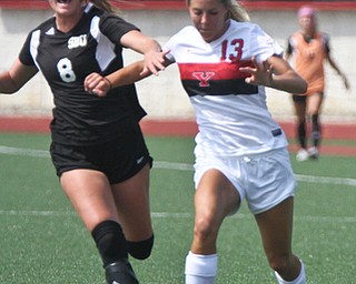 William D. Lewis The Vindicator  YSU'sAlison Green(13) ) and Bonaventure's Bella Marra(8) go for the ball during season opener Monday 8-21-17 at YSU.
