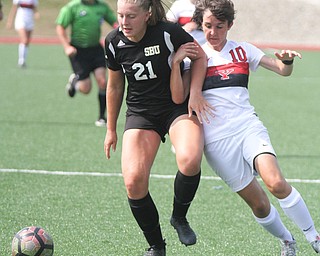 William D. Lewis The Vindicator  YSU'sRuth Penna(10) and Bonaventure's Maddie Mason(21) go for the ball during season opener Monday 8-21-17 at YSU.
