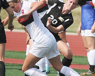 William D. Lewis The Vindicator  YSU's Marissa MArtin(8) and Bonaventure's Brittany Tubiolo(20) go for the ball during season opener Monday 8-21-17 at YSU.