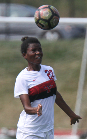 William D. Lewis The Vindicator  YSU's Rahse3da Abdul-Rahman(20) heads the ball during season opener Monday 8-21-17 at YSU.