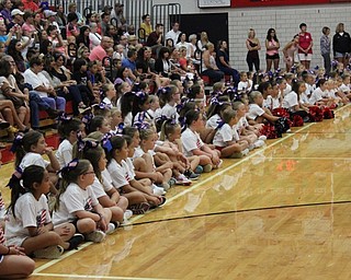 Neighbors | Abby Slanker.Attendees of the Canfield High School cheerleaders’ annual Kiddie Cheer Camp watched the CHS cheerleaders perform during the end-of-camp cheer demonstration for family and friends on Aug. 9.