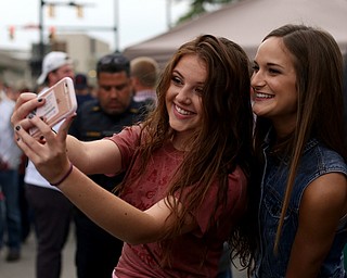 Grace Schaefer(left) and Rachel Kurcon both of Poland take a selfie while tailgating before the Zac Brown Band performs at Stambaugh Stadium, Thursday, August 24, 2017 at M70 parking lots at YSU in Youngstown...(Nikos Frazier | The Vindicator)