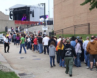 The crowd heading to the stadium before the Zac Brown Band performs at Stambaugh Stadium, Thursday, August 24, 2017 at M70 parking lots at YSU in Youngstown...(Nikos Frazier | The Vindicator)