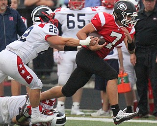 William D. Lewis The Vindicator Girrd's Mark Waid(7) eludes Niles' Prewton Turner(22) during 1rst half action in Girard 8-24-17.