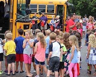 Neighbors | Abby Slanker.A Canfield Local Schools bus driver spoke to in-coming kindergarten students and their parents about school bus safety on Aug. 19.