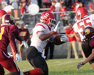 William D.Lewis The Vindicator   Struthers' Willie Mitchell(7) scrambles  during 1rst half action 8-25-17 at Liberty.