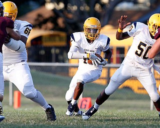 MICHAEL G TAYLOR | THE VINDICATOR-8-25-17 FOOTBALL Youngstown Golden Bears vs Boardman Spartans at Rayen Stadium, Youngstown, OH    1st qtr., East''s #15 Marcus Finkley runs for a 1st down.