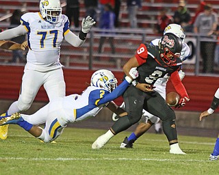 Valley Chrisitan's Jamar Nuby(2) causes a fumble by Campbell's Darrion Jones (9) during the third quarter of Friday nights matchup at Campbell Memorial High School.  Dustin Livesay  |  The Vindicator  8/25/17  Campbell