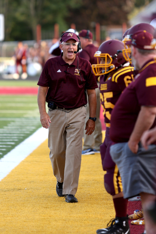 South Range Raiders head coach Dan Yeagley during the first quarter as Springfield local takes on South Range, Saturday, August 26, 2017, at Raider's stadium at the Rominger Sports Complex in Canfield...(Nikos Frazier | The Vindicator)..