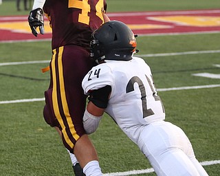 South Range Raiders running back Peyton Remish  (44) is taken out of bounds by Springfield Local Tiger running back Zack Stouffer  (24) during the second quarter as Springfield local takes on South Range, Saturday, August 26, 2017, at Raider's stadium at the Rominger Sports Complex in Canfield...(Nikos Frazier | The Vindicator)..