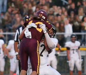 South Range Raiders quarterback Isaac Allegretto  (12) knocks the ball out of Springfield Local Tiger wide receiver  Shane Eynon  (12)'s hands during the second quarter as Springfield local takes on South Range, Saturday, August 26, 2017, at Raider's stadium at the Rominger Sports Complex in Canfield...(Nikos Frazier | The Vindicator)..