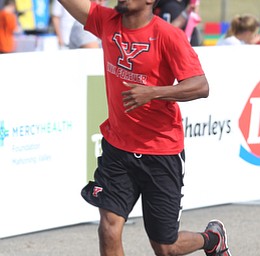 YSU men's basketball player Cameron Morse completes the 2 mile run during the 8th annual Panerathon, Sunday, August 27, 2017 at the Covelli Centre in Youngstown...(Nikos Frazier | The Vindicator)
