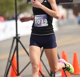 Rachel Slingluff(23), of Cuyahoga Falls, completes the 10k run during the 8th annual Panerathon, Sunday, August 27, 2017 at the Covelli Centre in Youngstown. Slingluff placed second with a time of 37:12.8 in the Open Women category. ..(Nikos Frazier | The Vindicator)