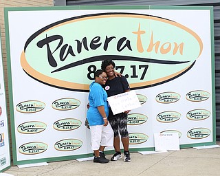 Joella Maybury(right) poses for a photo with her daughter, Alethea during the 8th annual Panerathon, Sunday, August 27, 2017 at the Covelli Centre in Youngstown. Joella is a breast cancer survivor...(Nikos Frazier | The Vindicator)